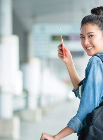 attractive-asian-female-woman-wearing-casual-travel-cloth-walking-waiting-transit-departure-building-outdoor-backgroundasian-female-travel-concept