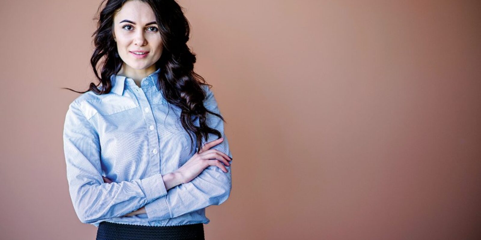 good-looking-business-woman-with-arms-crossed